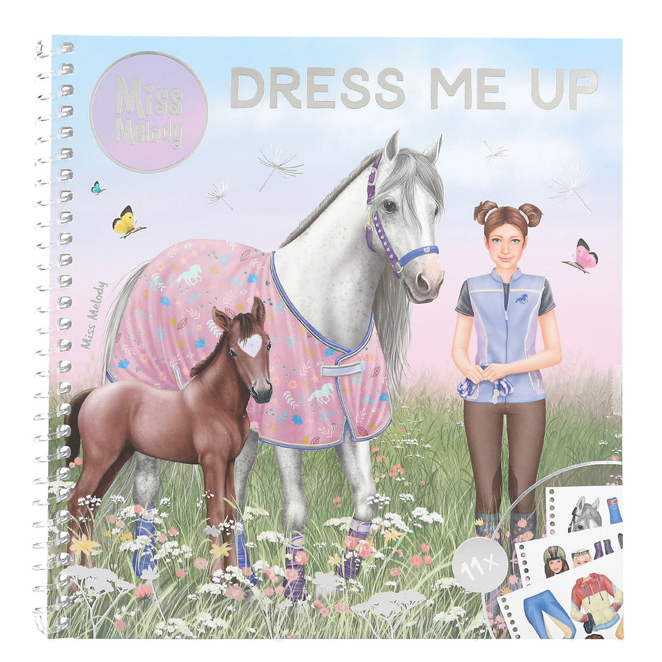 Valokuva kirjasta  Miss Melody Dress Me Up Tarrakirja, kuuluu tuoteryhmään Väritys-puuhakirjat.