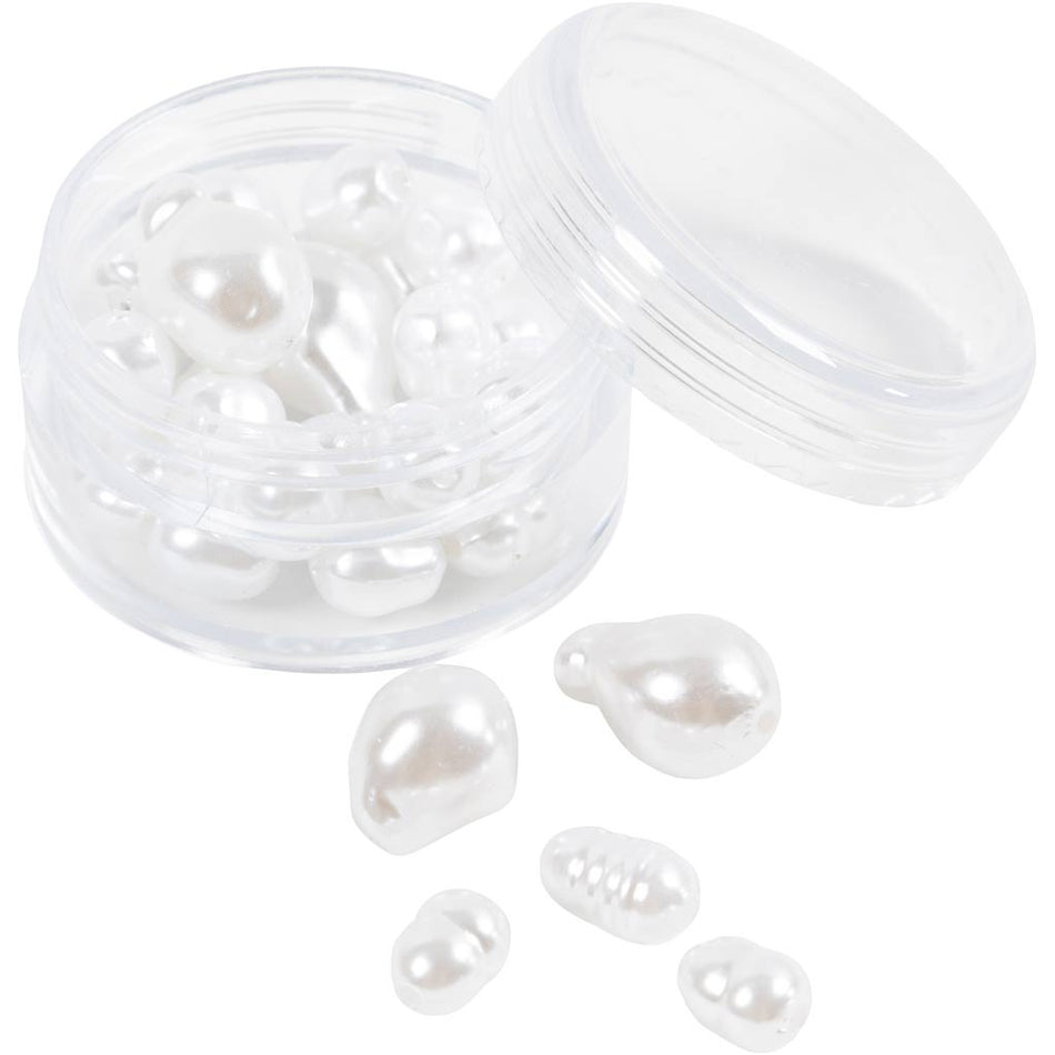 Valokuva tuotteesta Vahahelmet 30 kpl soikeat helmiäisvalkoiset, kuuluu tuoteryhmään Askartelutarvikkeet.