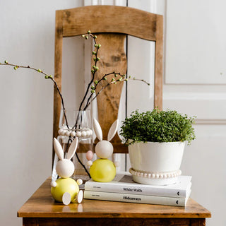 Koriste Aarikka Pupujussi istuva keltainen