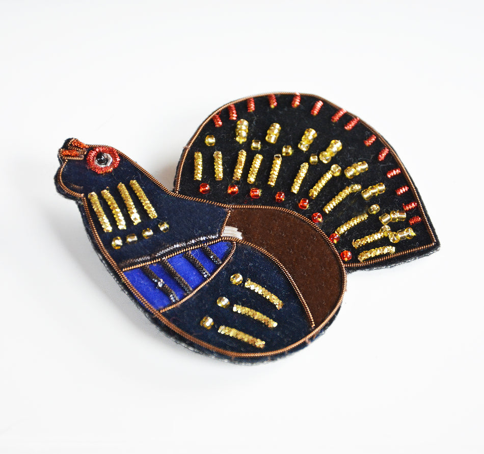 Valokuva tuotteesta Rintakoru Mum's Metso, kuuluu tuoteryhmään Korut.