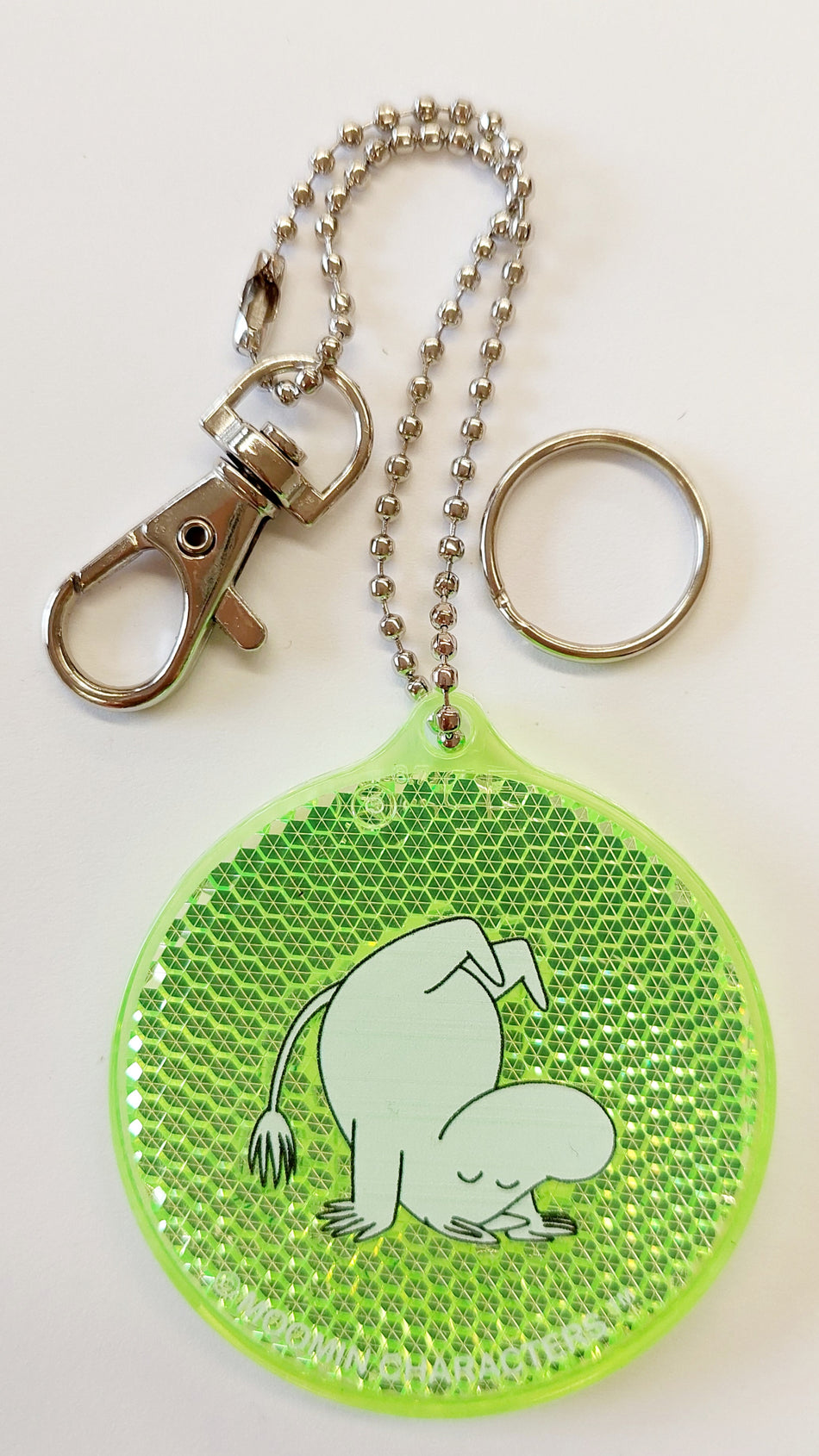 Valokuva tuotteesta Heijastin Muumipeikko pyöreä vihreä, kuuluu tuoteryhmään Sesonkituotteet.