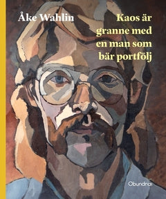 Valokuva kirjasta Åke Wahlin Kaos är granne med en man som bär portfölj, kuuluu tuoteryhmään Ruots kaunokirjat.