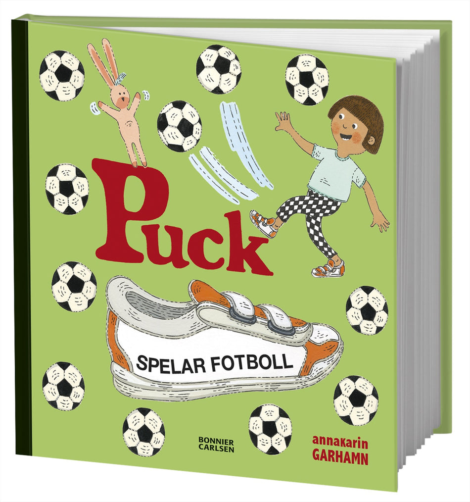 Valokuva kirjasta Anna-Karin Garhamn Puck spelar fotboll, kuuluu tuoteryhmään Ruots lapset nuoret ja sarjakuvat.